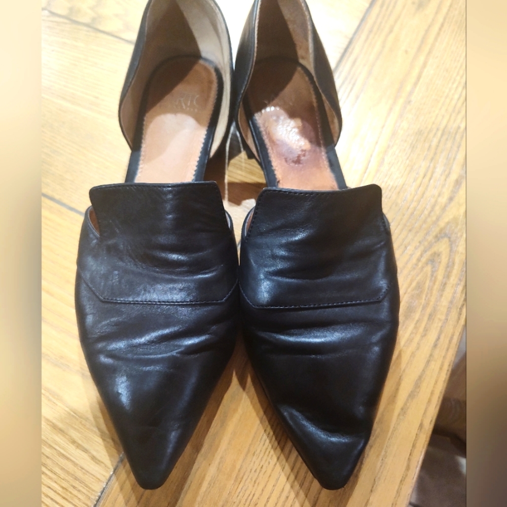 Pointed toe, black dress shoes. Showing a bit of wear but lots of wear left